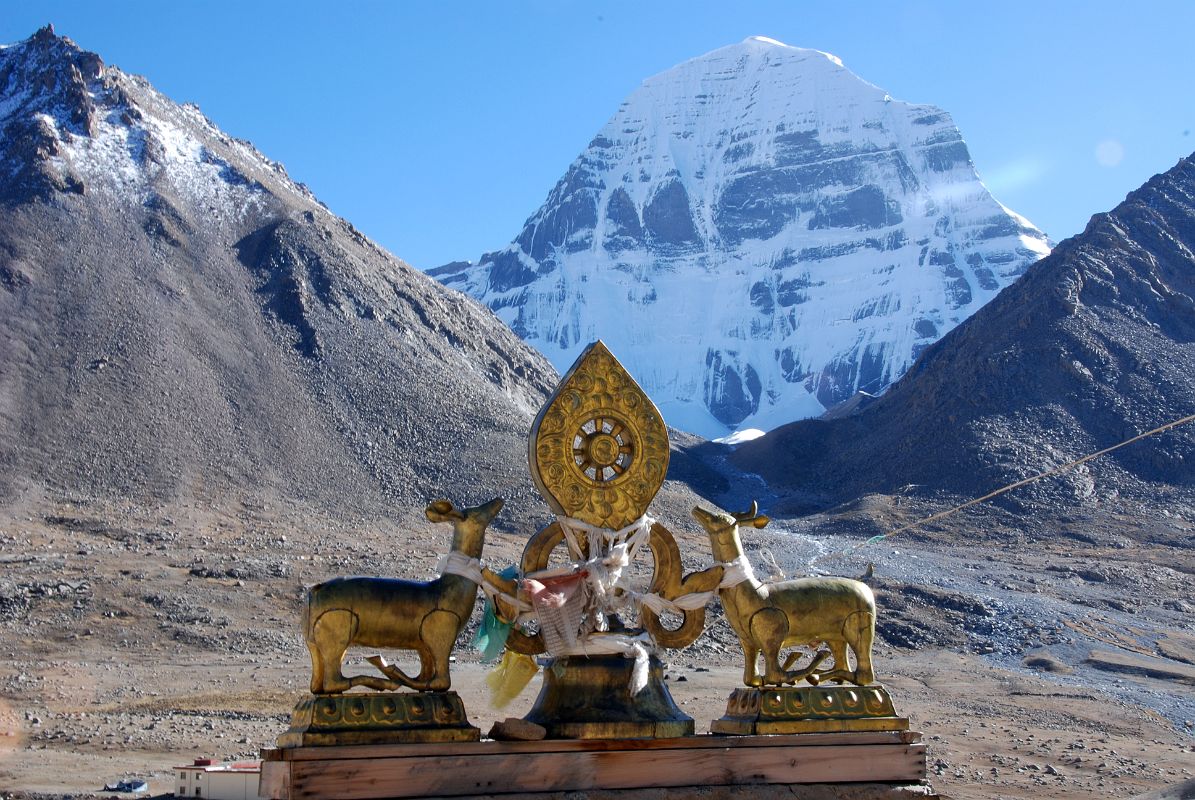 36 Mount Kailash North Face And Golden Deer And Dharma Wheel From The Roof Of Dirapuk Gompa On Mount Kailash Outer Kora The roof of the Dirapuk Gompa with the golden deer and dharma wheel has a perfect view of Mount Kailash North Face.